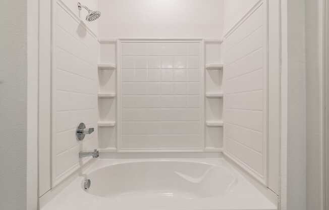 Tiled Shower With Built-In Shelving In The Shower