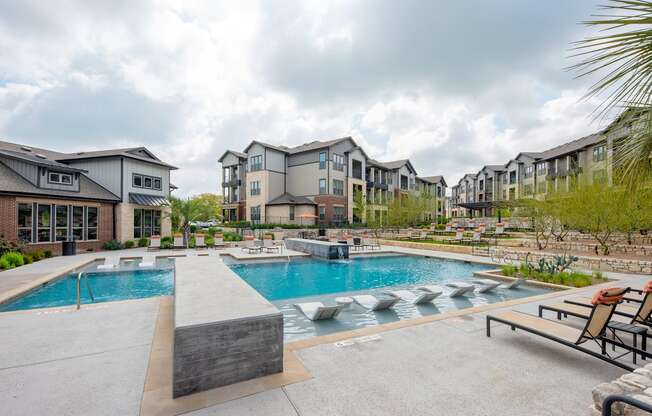 Pool Side Relaxing Area With Sundeck at Fifty02 Westover Hills, Texas