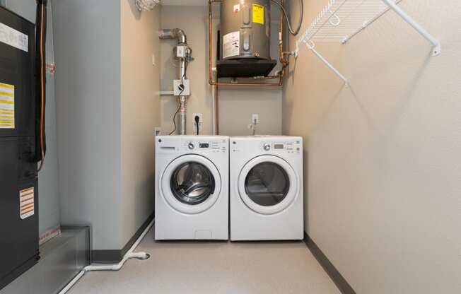 laundry room with storage space