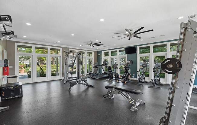 Community Fitness Center with Equipment at Fountains Lee Vista Apartments in Orlando, FL.