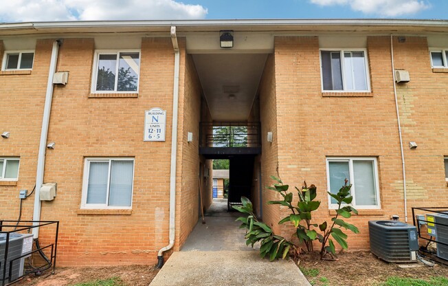 Step into The Preserve On Conley Apartments, where modern living meets comfort. This inviting entrance sets the tone for what's inside—stylish spaces and vibrant community living. Explore your new home today!