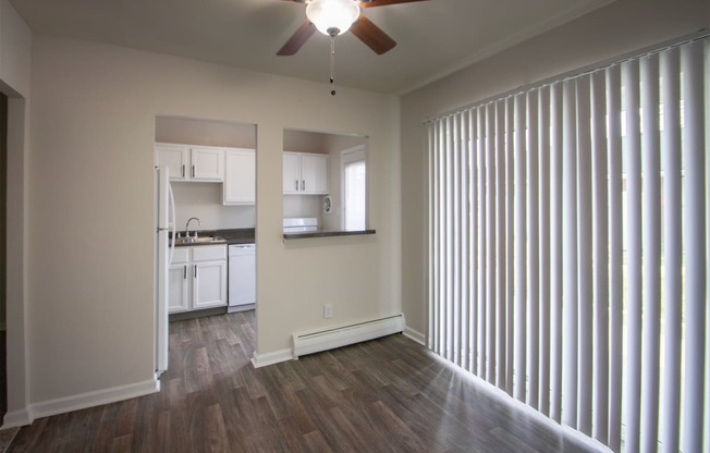 This is a photo of the kitchen with pass through window from the dining room in the 631 square foot, B-style (Ranch) 1 bedroom/1 bath floor plan at Colonial Ridge Apartments in the Pleasant Ridge neighborhood of Cincinnati, OH.