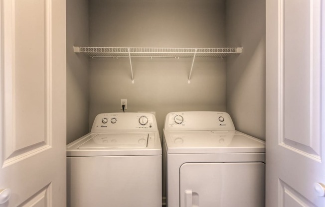 a washer and dryer in the laundry room of a house