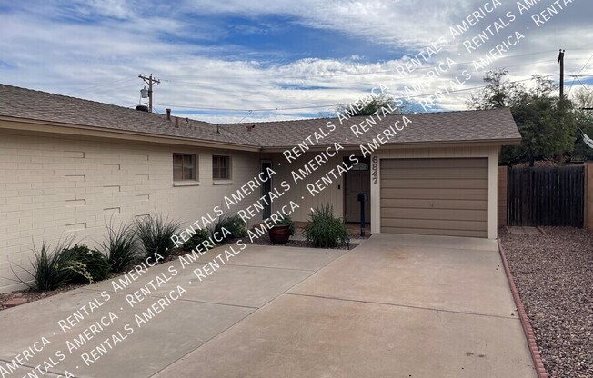 6847 E WINDSOR AVE 