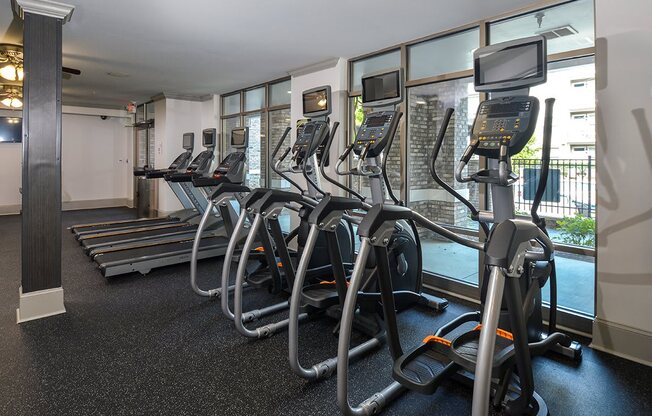 a gym with a row of exercise bikes at The Tribute, North Carolina, 27612