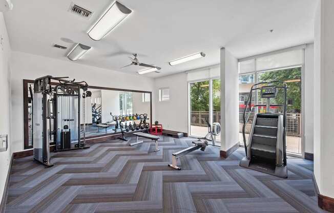 the gym in the home is equipped with weights and cardio equipment