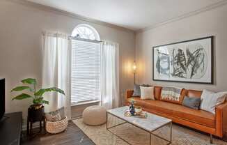 a living room with a couch and a coffee table at Volare at the Woodlands, The Woodlands, TX