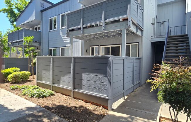 Large Downstairs Condo in Nice Community, New Wood Flooring, Fresh Paint, Garage, Great Location!