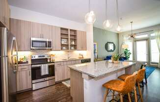 The Crosby at The Brickyard kitchen view with great natural lighting Dallas Texas Apartment