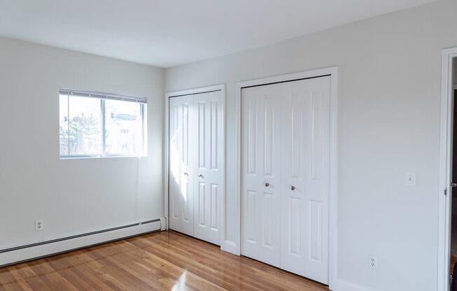 Adams Village apartments view of spacious bedrooms with lots of light