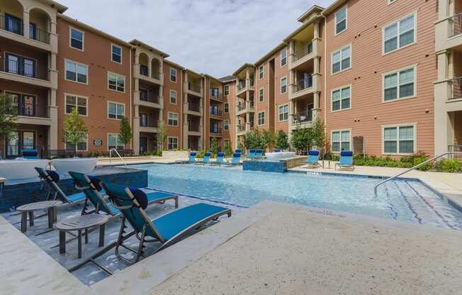 our apartments have a large pool and lounge chairs