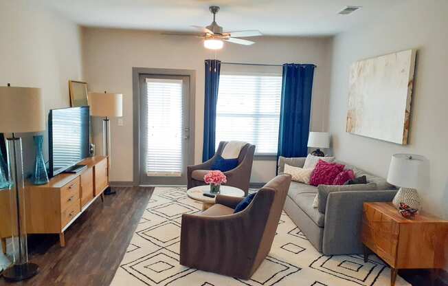 Classic One White Oak Living Room Design With Television in Cumming Apartments for Rent