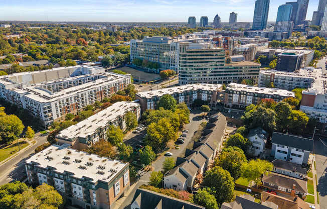 Flatiron West Trade Apartments aerial view with Charlotte skyline in background