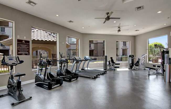 A spacious gym with a variety of exercise equipment.