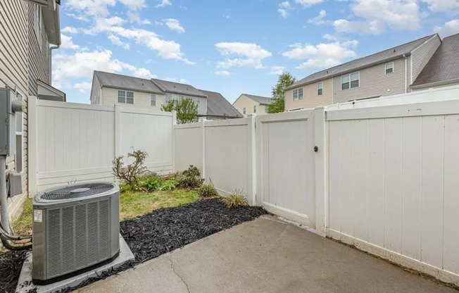 Immaculate beautiful 3-bedroom, 2.5-bath townhouse in Greensboro with 1 car garage/fenced in patio