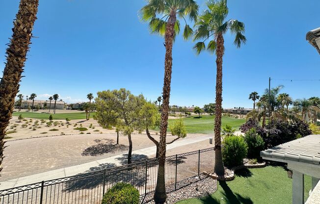 GORGEOUS 2 STORY HOME WITH A GRAND ENTRY & GOLF COURSE VIEW LOCATED INSIDE THE COMMUNITY OF RHODES RANCH