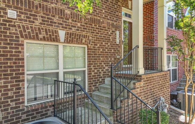 **ALL BRICK, THREE STORY TOWNHOME WITH FLOOR PLAN THAT INCLUDES 3 BEDROOMS, 3.5 BATHS, PLUS HOME OFFICE, MEDIA, OR WORKOUT ROOM**