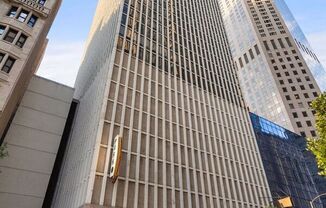 100 East WALTON Street