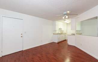 Dining Room with Hardwood Floors and Chandelier