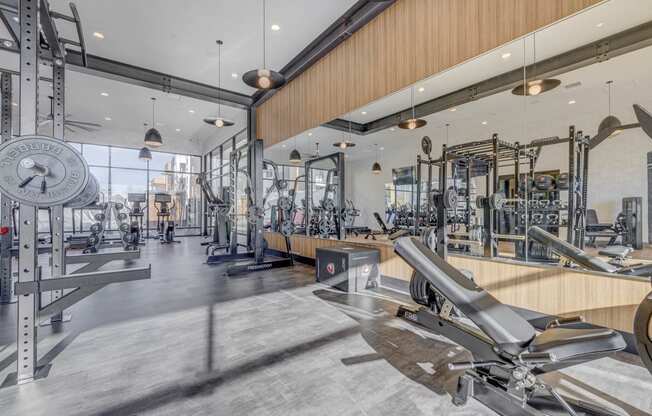 a gym with weights machines and other exercise equipment