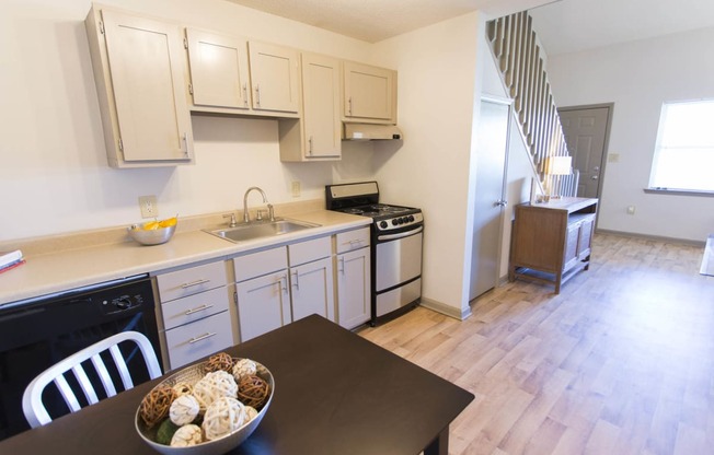 Kitchen with dining area at Lofts of Wilmington, Wilmington, North Carolina