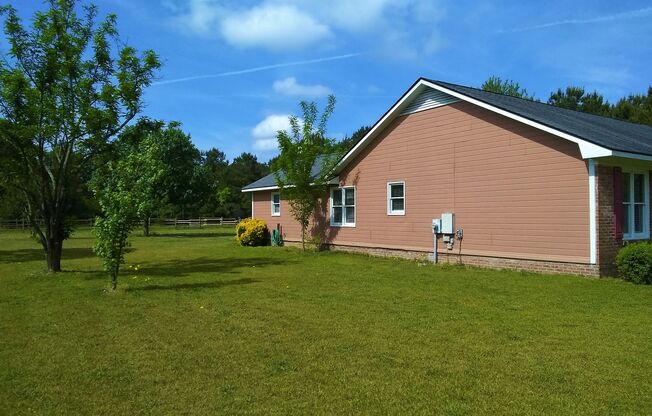 COUNTRY LIVING AT ITS BEST!!! Gorgeous 3 Bedroom / 2.5 Bathroom Ranch in Grays Creek District!