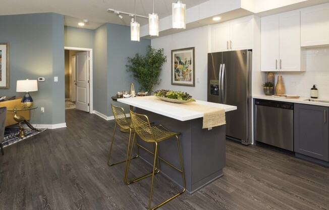 Large kitchens with Moen faucets and custom cabinetry