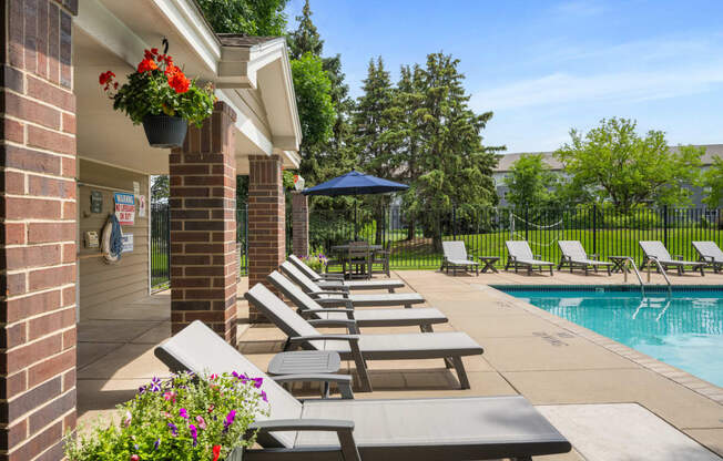 our apartments have a pool and lounge chairs