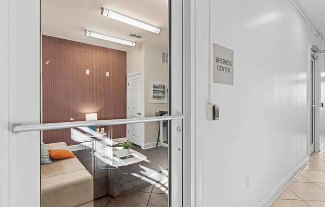 a view of a living room from a glass door