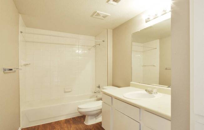 Wood Style Flooring in Bathroom at Stoneleigh on Cartwright Apartments, J Street Property Services, Mesquite