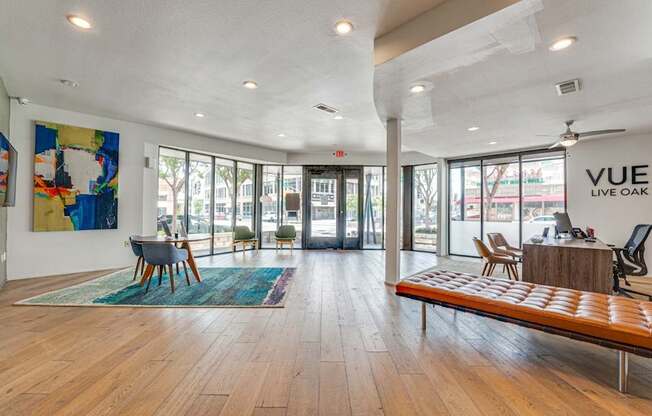 Modern leasing office lobby with floor to ceiling windows at Vue Live Oak Apartments, Texas, 75204