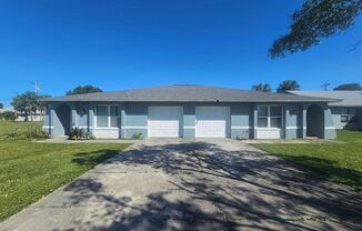 Location Location Location of this nice 3 bed 2 bath 1 car garage duplex in Cape Coral!