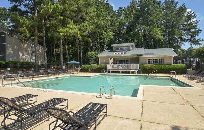 Daytime view poolat Harvard Place Apartment Homes by ICER, Lithonia, GA, 30058